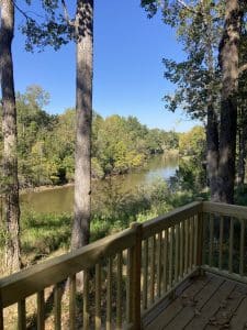 photo of rocky creek from the back porch of a cabin