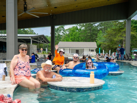 Swim up bar and lazy river at blue bayou bend | two creeks crossing resort swim up bar and lazy river at blue bayou bend