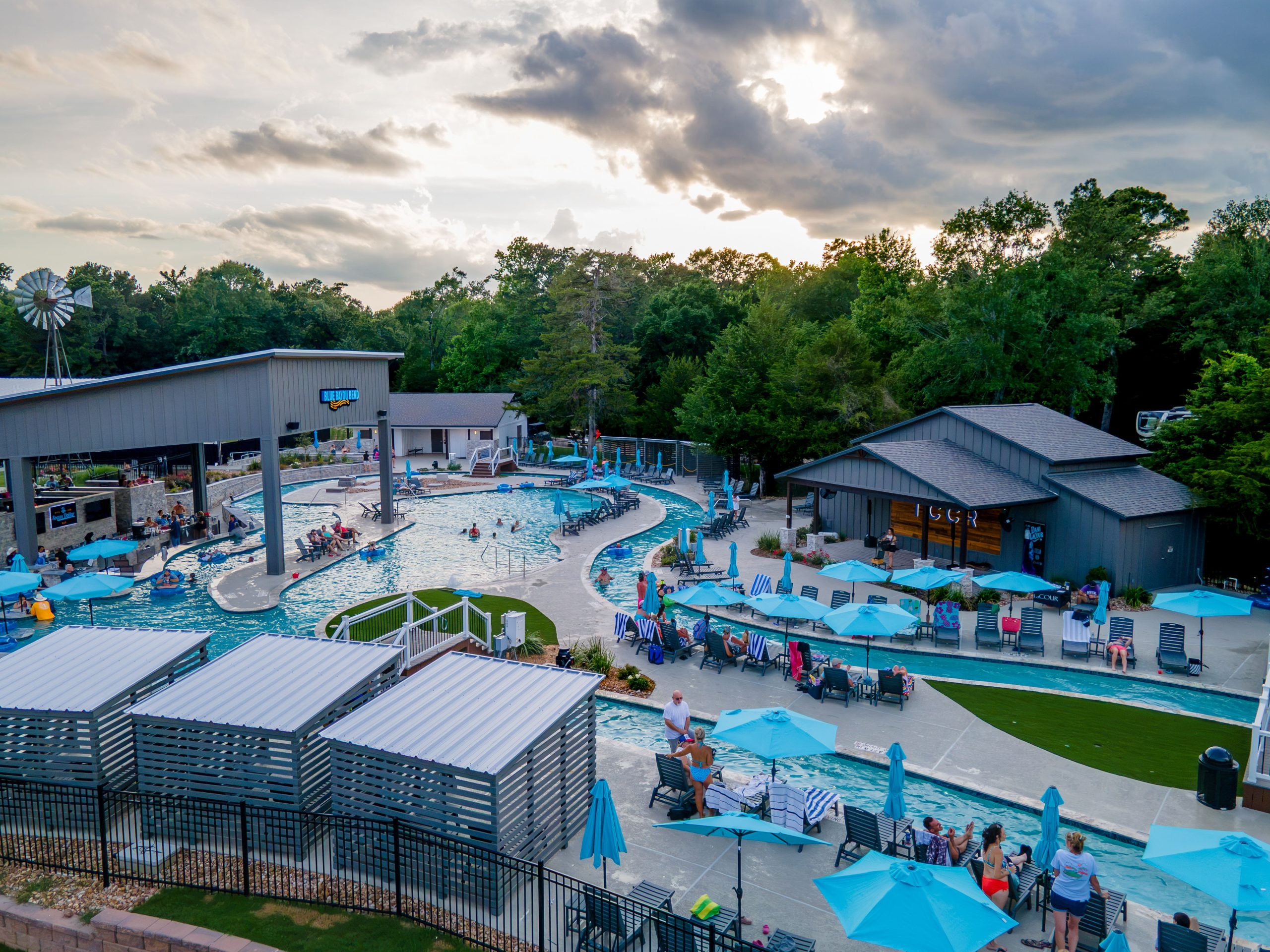 Aerial view of Blue Bayou Bend with the lazy river and cabanas at Two Creeks Crossing Resort Aerial view of Blue Bayou Bend with the lazy river and cabanas at Two Creeks Crossing Resort